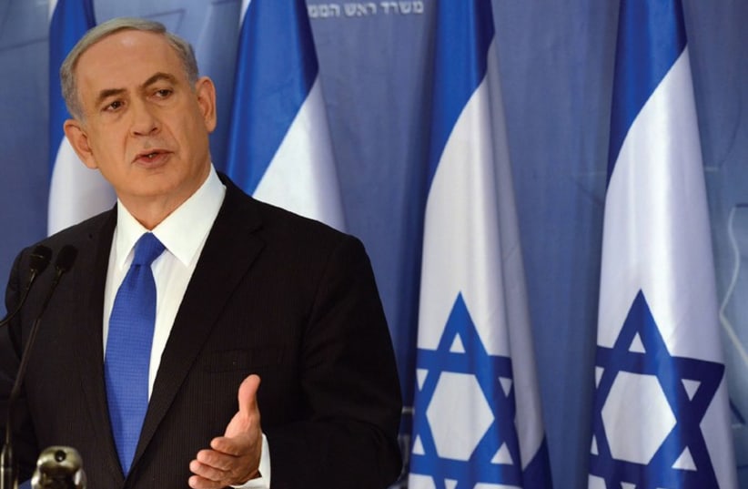 PRIME MINISTER Binyamin Netanyahu speaks at a press conference in Tel Aviv on Friday (photo credit: HAIM ZACH/GPO)