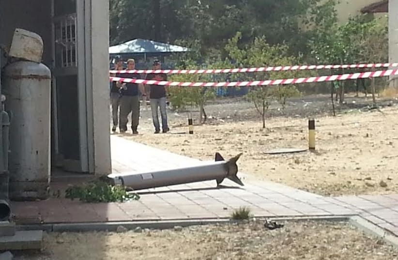 Rocket falls in courtyard of home in Rishon Lezion (photo credit: YEHUDA REHAMIM/NEWS 24)