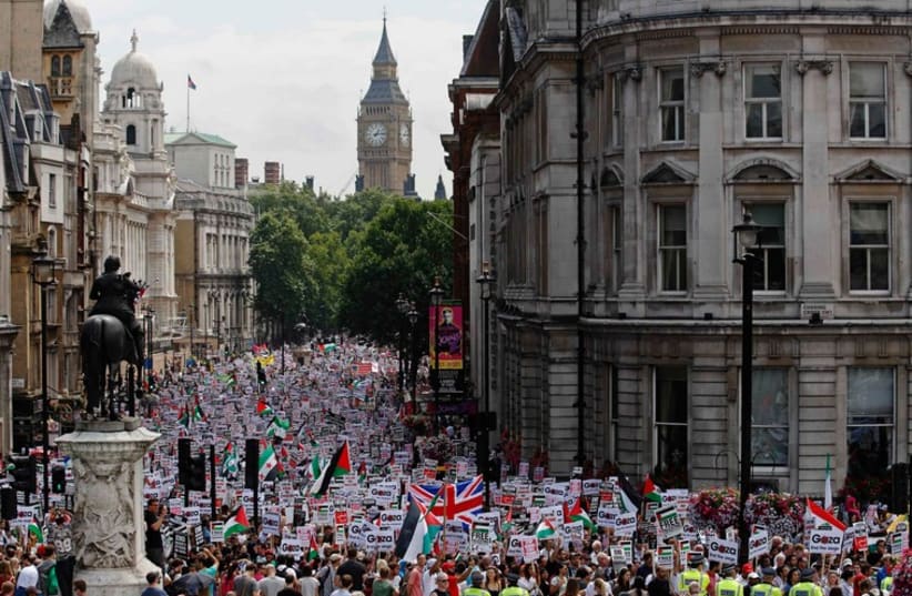 Demonstrators march in central London July 19 (photo credit: REUTERS)