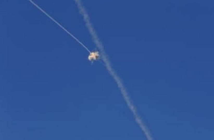 An interception of a rocket by the Iron Dome. (photo credit: REUTERS)