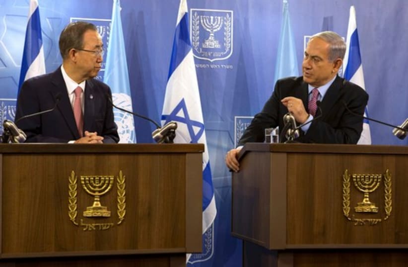 Israeli Prime Minister Benjamin Netanyahu (R) gestures as he speaks during a joint news conference with U.N. Secretary General Ban Ki-Moon at the Defence Ministry in Tel Aviv July 22, 2014. (photo credit: REUTERS)