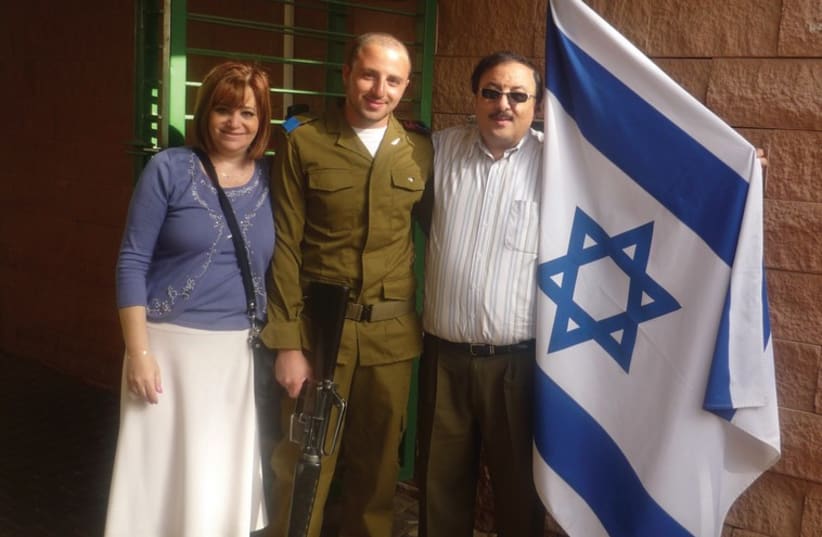 David Esses with his parents during his army service. (photo credit: Courtesy)