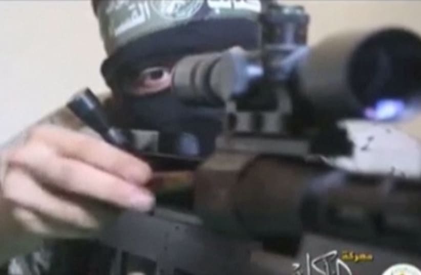 Hamas' armed wing, releases video it says shows fighters using a Hamas-made sniper rifle to shoot Israeli soldiers. (photo credit: screenshot)