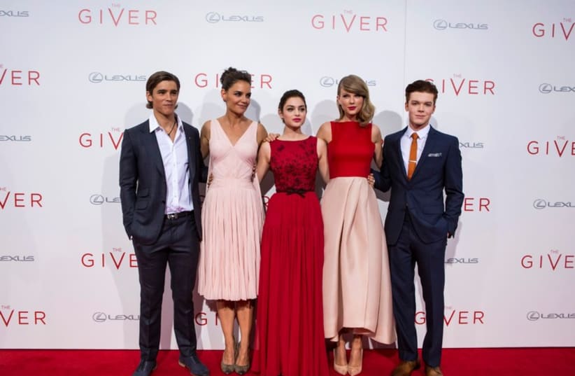 Katie Holmes, Odeya Rush, Taylor Swift attend premiere of "The Giver" in New York August 11 (photo credit: REUTERS)