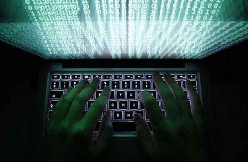 Cyber hackers [illustrative] (photo credit: REUTERS)