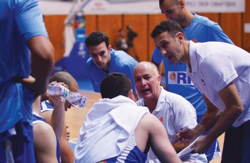Israel coach Erez Edelstein (center) has guided the national team to first place in EuroBasket qualifying Group B after three games, but he knows nothing has been decided yet with three teams tied at 2-1 at the midway point of the campaign. (photo credit: BULGARIAN BASKETBALL ASSOCIATION)