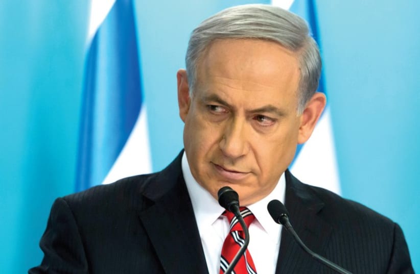 Prime Minister Benjamin Netanyahu holds a news conference at his office in Jerusalem, August 6. (photo credit: REUTERS)