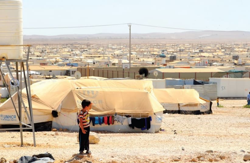 Zaatari refugee camp with Syria in the distance. (photo credit: MICHAEL WILNER)