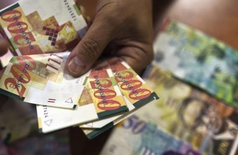 Shekel money bills (photo credit: REUTERS)