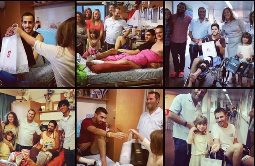 THE BOTEACH family visiting wounded soldiers at Sheba Medical Center (photo credit: Courtesy)