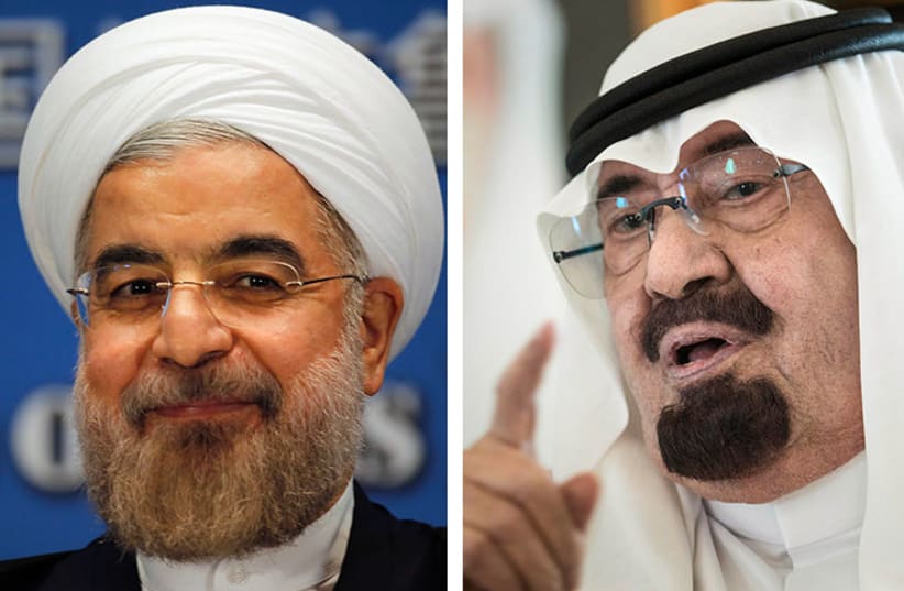 Rouhani and Abdullah (photo credit: REUTERS)