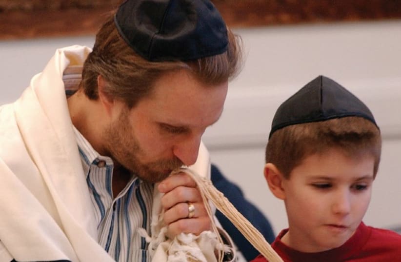 Bar Mitzva practice at Anshe Emet Synagogue in Chicago. (photo credit: CHICAGO TRIBUNE/MCT)