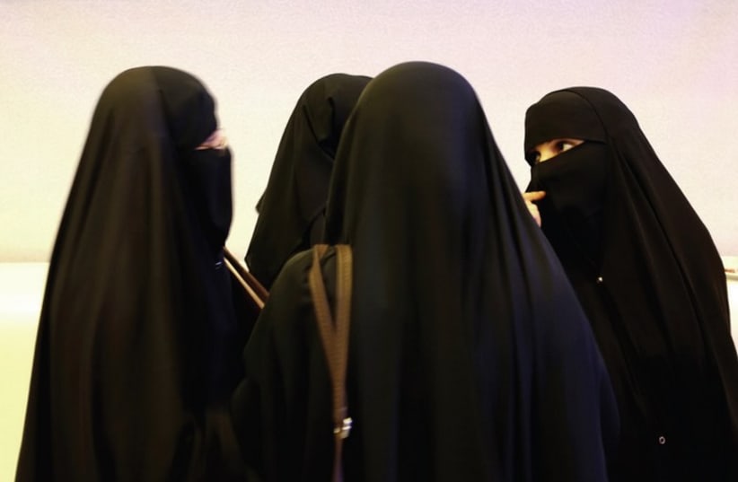 Women in Saudi Arabi attend an education conference seminar. (photo credit: REUTERS)