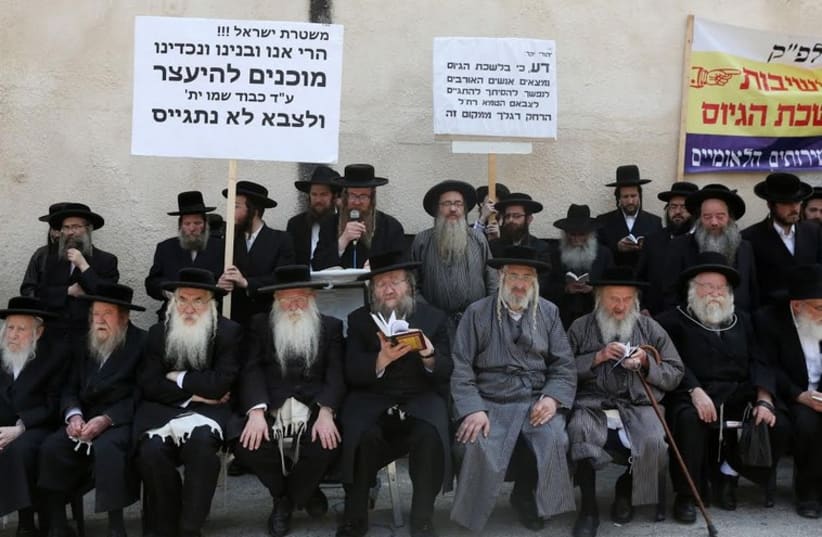 Ultra-Orthodox Jews protest the arrest of a yeshiva student who refused to be drafted. (photo credit: MARC ISRAEL SELLEM)