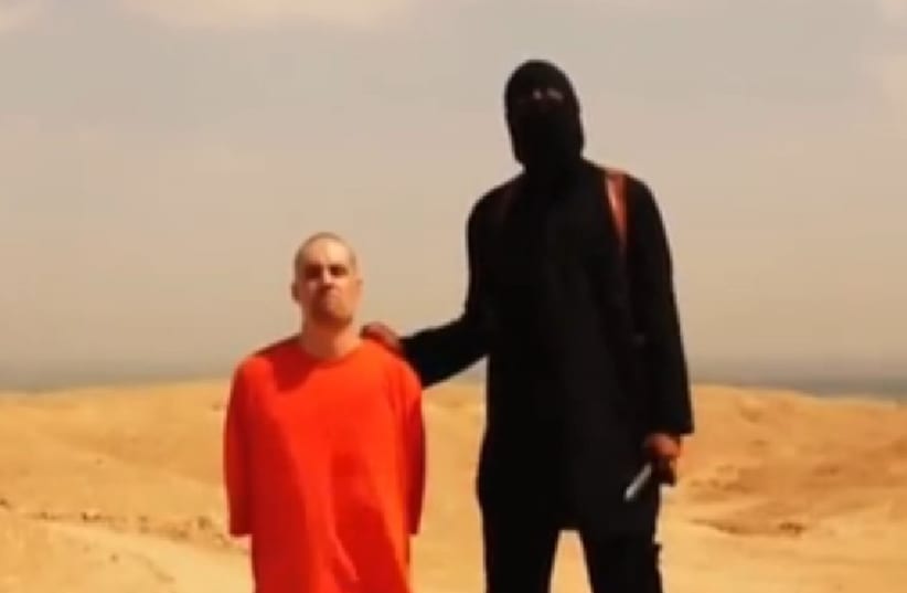 Islamic State terrorist and James Foley (photo credit: YOUTUBE SCREENSHOT)