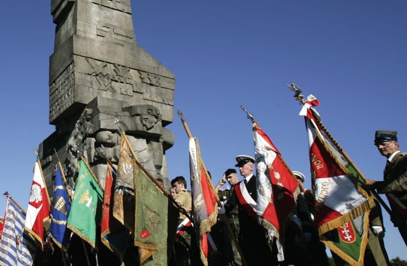 A Polish guard of honor during ceremony September 1 in front of the Westerplatte monument erected where first shots of World War II were fired on September 1, 1939 (photo credit: REUTERS)