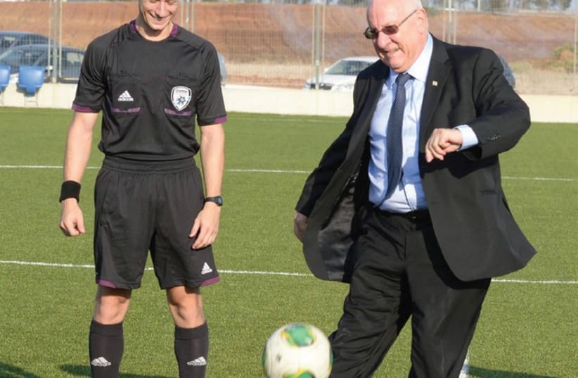 PRESIDENT REUVEN RIVLIN is on the ball. (photo credit: Courtesy)