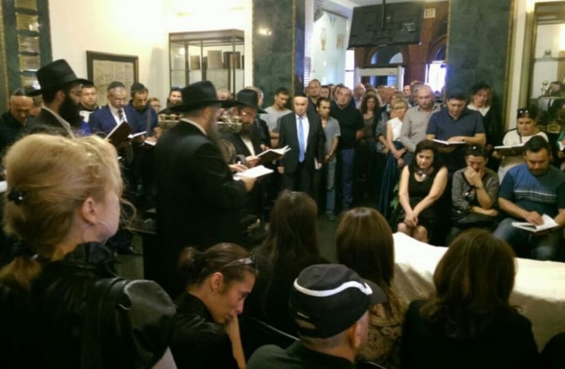 Displaced Jews from Donetsk bid farewell to George (Eliyahu) Zilberbordfrom who was killed by rebels in Kiev (photo credit: VAAD OF UKRAINE)