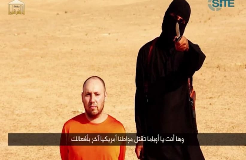 Slain journalist Steven Sotloff shortly before he is beheaded by an Islamic State terrorist. (photo credit: Courtesy)