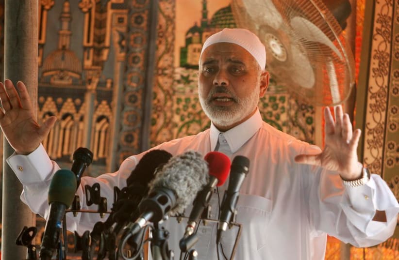 Senior Hamas leader Ismail Haniyeh delivers a speech during Friday prayers, September 5, 2014.  (photo credit: REUTERS)