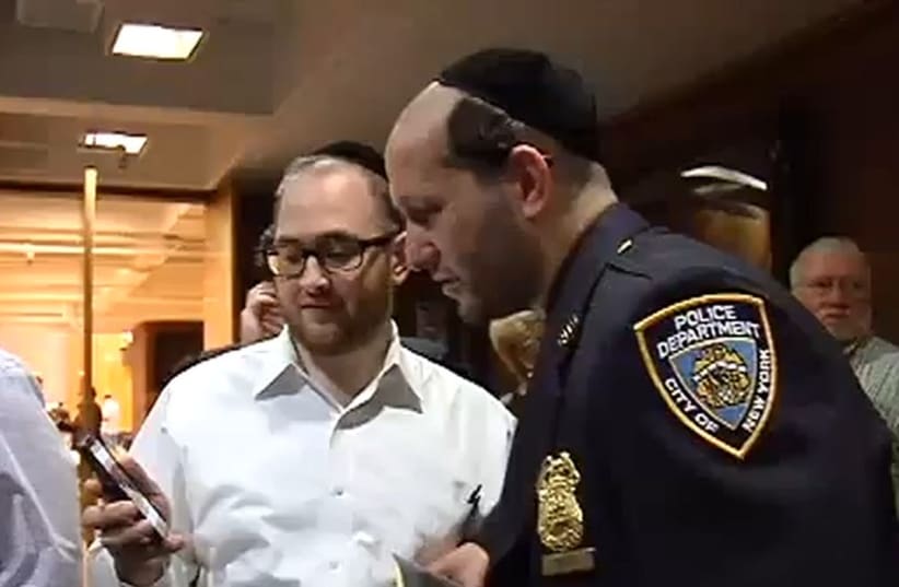 Sgt. Joel Witriol, NYPD's highest-ranked hassid. (photo credit: YOUTUBE SCREENSHOT)
