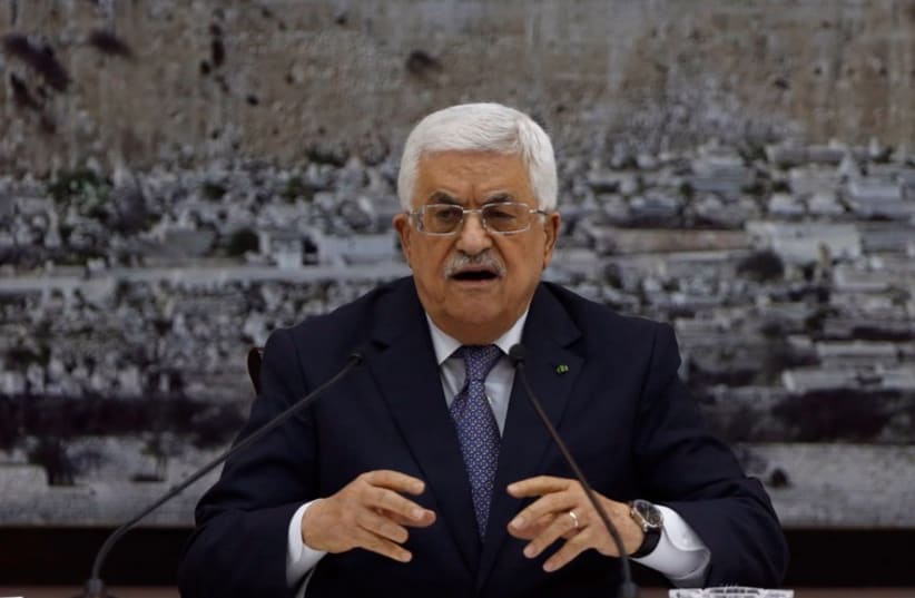 Palestinian Authority President Mahmoud Abbas gestures during a meeting with Palestinian leadership in the West Bank city of Ramallah (photo credit: REUTERS)