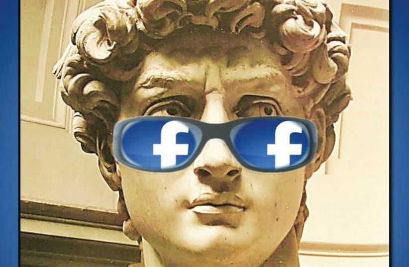 The statue of David, by Michelangelo, gets an update with sunglasses with the Facebook logo in the frames. (photo credit: COURTESY KARNI GAMLIEL)