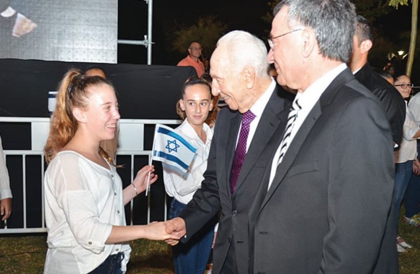 Shimon Peres and Herzliya Mayor Moshe Fadlon at the city’s 90th anniversary celebrations. (photo credit: Courtesy)
