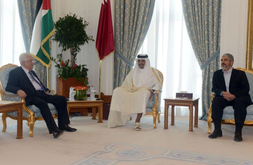 Palestinian Authority President Mahmoud Abbas, Emir of Qatar Sheikh Tamim bin Hamad al-Thani, Hamas leader Khaled Meshaal meet in Doha August 21, 2014 (photo credit: REUTERS)