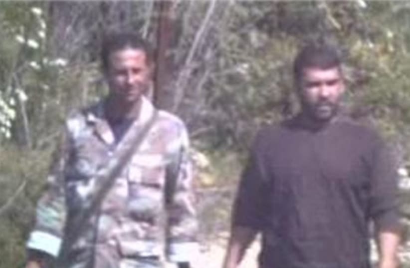 Openly armed Hezbollah members spotted near the Israeli border. (photo credit: Courtesy)
