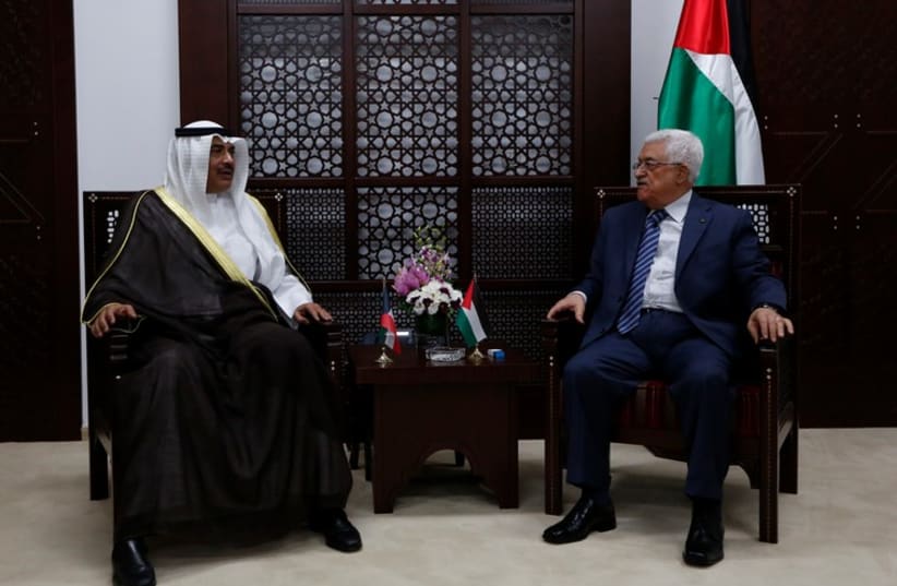 Palestinian Authority President Mahmoud Abbas meets Kuwait's Minister of Foreign Affairs Sheikh Sabah al Khalid al Sabah in Ramallah, September 14 (photo credit: REUTERS)