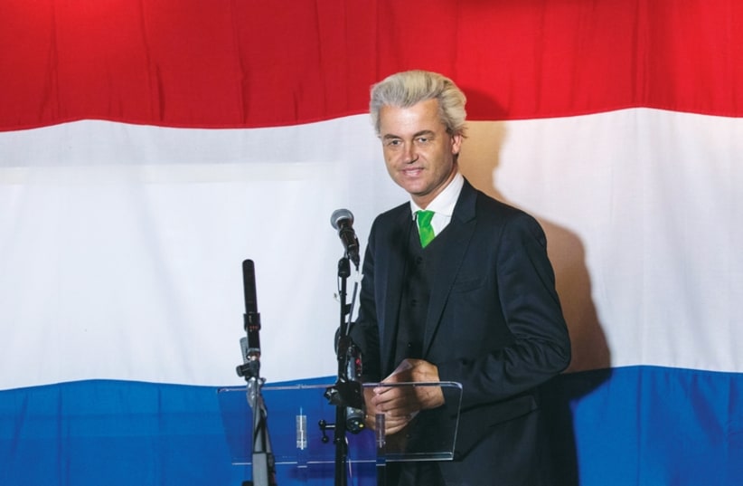 Far right dutch politician Geert Wilders of the antiimmigration Freedom (PVV) Party arrives at a PVV rally after the European Parliament elections. (photo credit: REUTERS)