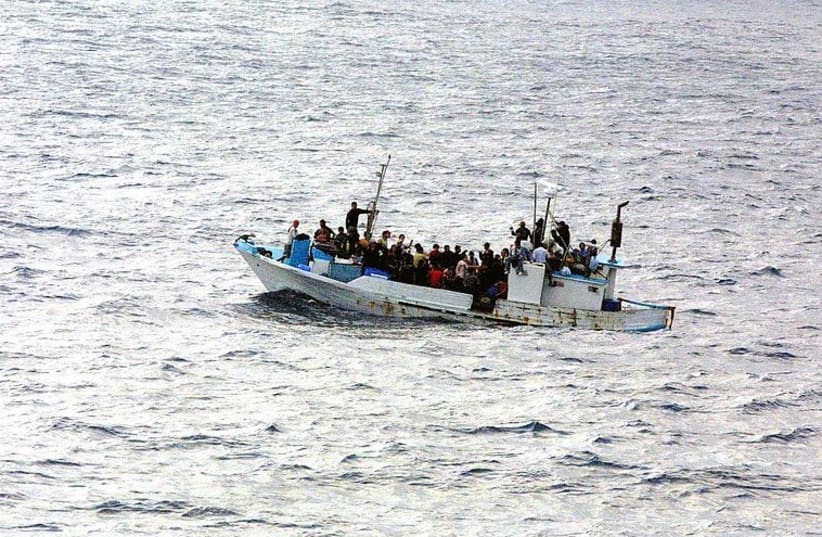 Immigrants on a boat [file] (photo credit: Wikimedia Commons)