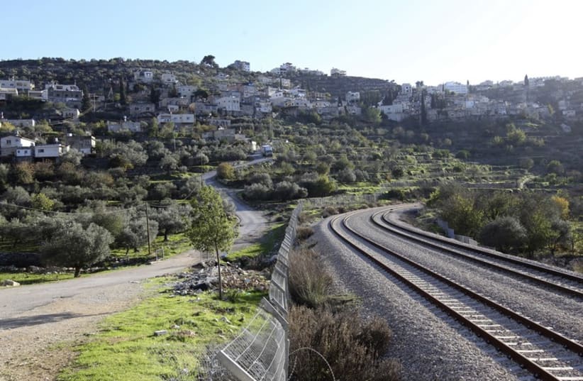 A train track running along the 1949 armistice line is seen near terraced agricultural fields in Battir village, south of Jerusalem (photo credit: REUTERS)