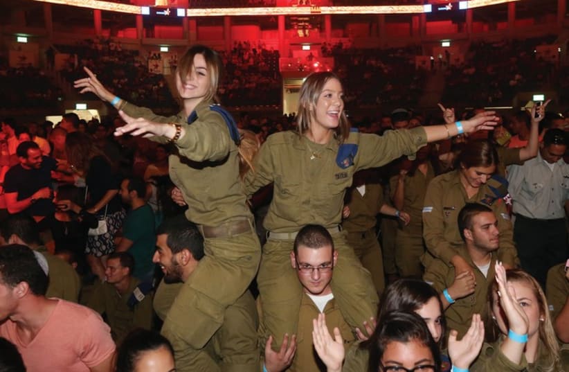 CELEBRATING AT THE opening the Payis Arena in Malha last week. Was the audience representative of Jerusalem? (photo credit: MARC ISRAEL SELLEM)