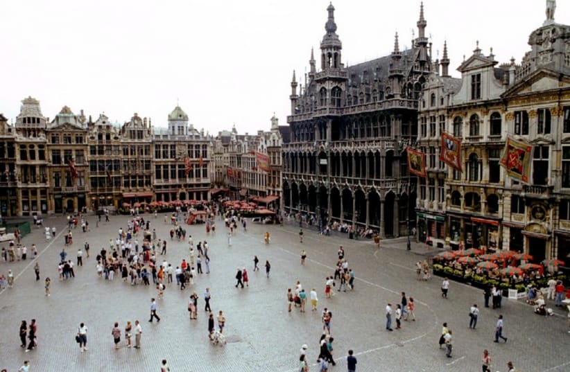 An aerial view of people walking through the Brussels Grand' Place (photo credit: REUTERS)