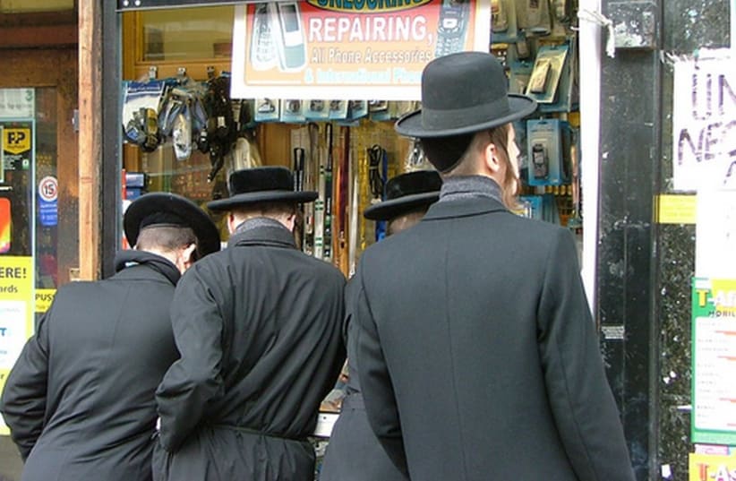 Ultra-Orthodox men in Stamford Hill (photo credit: Wikimedia Commons)