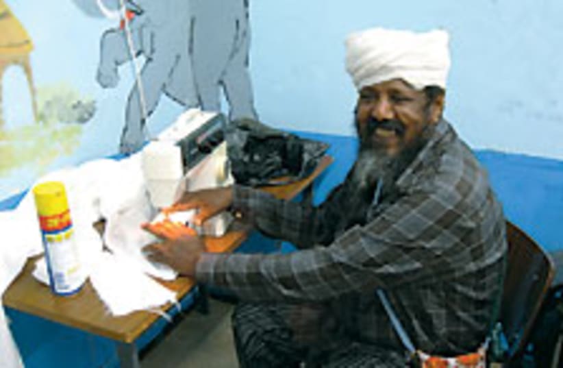 ethiopian man sewing 88 224 (photo credit: Courtesy)