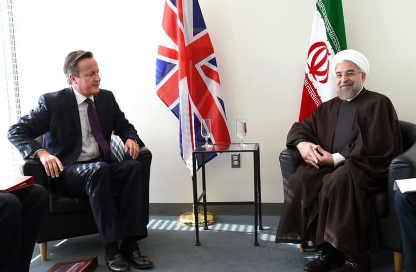 Britain's Prime Minister David Cameron meets with Iran's President Hassan Rouhani at UN General Assembly, September 24 (photo credit: REUTERS)