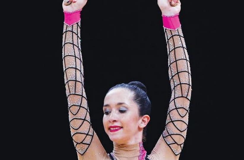 Israel’s Neta Rivkin ended the Rhythmic Gymnastics World Championships Individual All-Around final in a career-best ninth place in Izmir, Turkey on Friday. (photo credit: REUTERS)