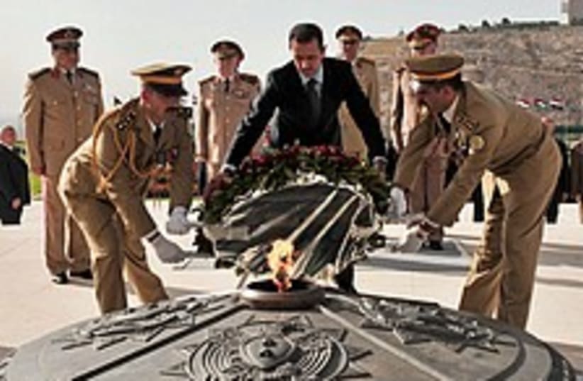 assad martyrs wreath 224 88 ap (photo credit: AP)