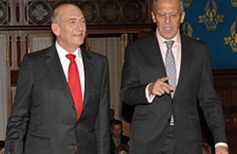olmert lavrov gay couple shopping 224.8  (photo credit: GPO [file])