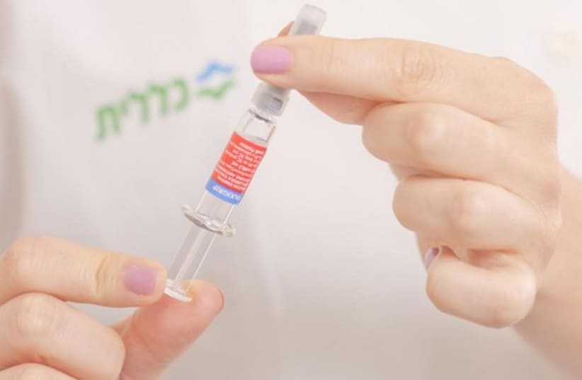 Vaccination against the flu (photo credit: CLALIT HEALTH SERVICES)
