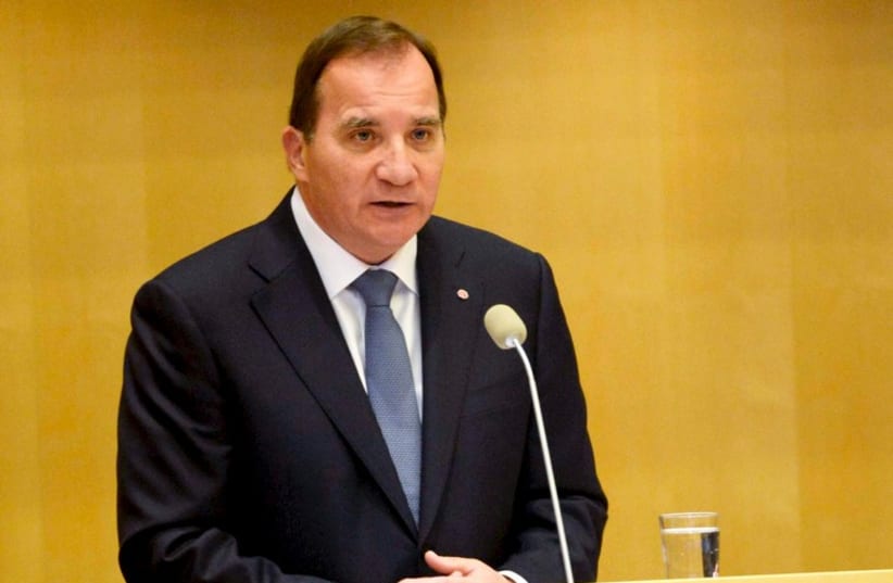 Sweden's Prime minister Stefan Lofven announces his new government during a Parliament session in Stockholm October 3 (photo credit: REUTERS)