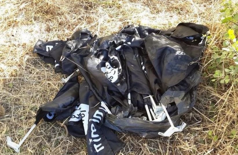 Islamic State flags found in Nazareth Illit.‏ (photo credit: ISRAEL POLICE)