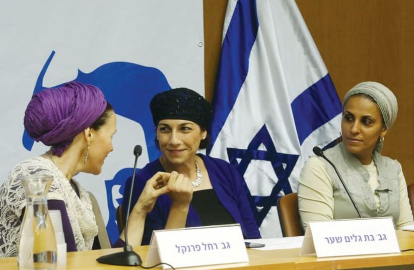 From left to right: Rachel Fraenkel, Bat-Galim Shaer and Iris Yifrah speak at the Knesset on June 25, five days before their son’s were discovered near Halhoul. (photo credit: MARC ISRAEL SELLEM/THE JERUSALEM POST)