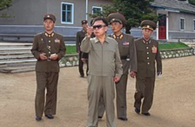Kim Jong Il soldiers 224.88 (photo credit: AP)