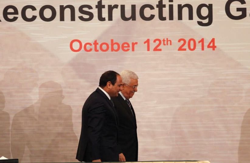 PA President Mahmoud Abbas and Egyptian President Abdel Fattah al-Sisi attend the Gaza reconstruction conference (photo credit: MOHAMED ABD EL GHANY/REUTERS)