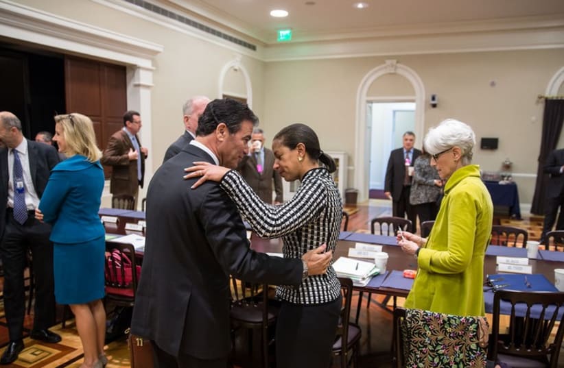 Susan Rice greets Yossi Cohen, National Security Advisor to Prime Minister Benjamin Netanyahu of Israel, prior to a meeting in the Eisenhower Executive Office Building of the White House (photo credit: COURTESY WHITE HOUSE)