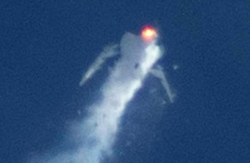 The Virgin Galactic SpaceShipTwo rocket explodes (photo credit: REUTERS)